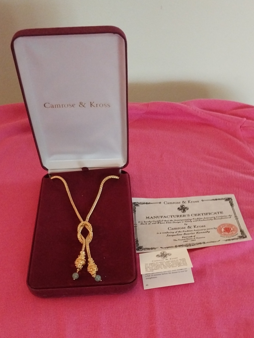 Gold Knot Pendant Necklace with Jade Green Accents